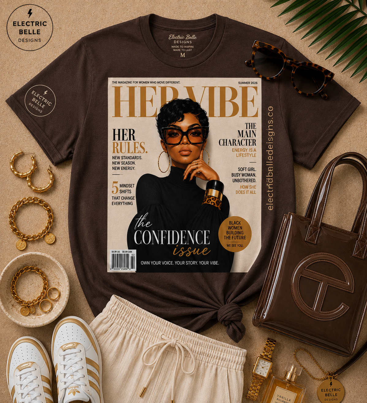 Brown HER VIBE Confidence Issue graphic tee styled with cream drawstring linen pants, white and gold sneakers, brown jelly bag, gold jewelry and tortoiseshell sunglasses.