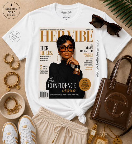 White HER VIBE Confidence Issue graphic tee styled with cream drawstring linen pants, white and gold sneakers, brown jelly bag, gold jewelry and tortoiseshell sunglasses.